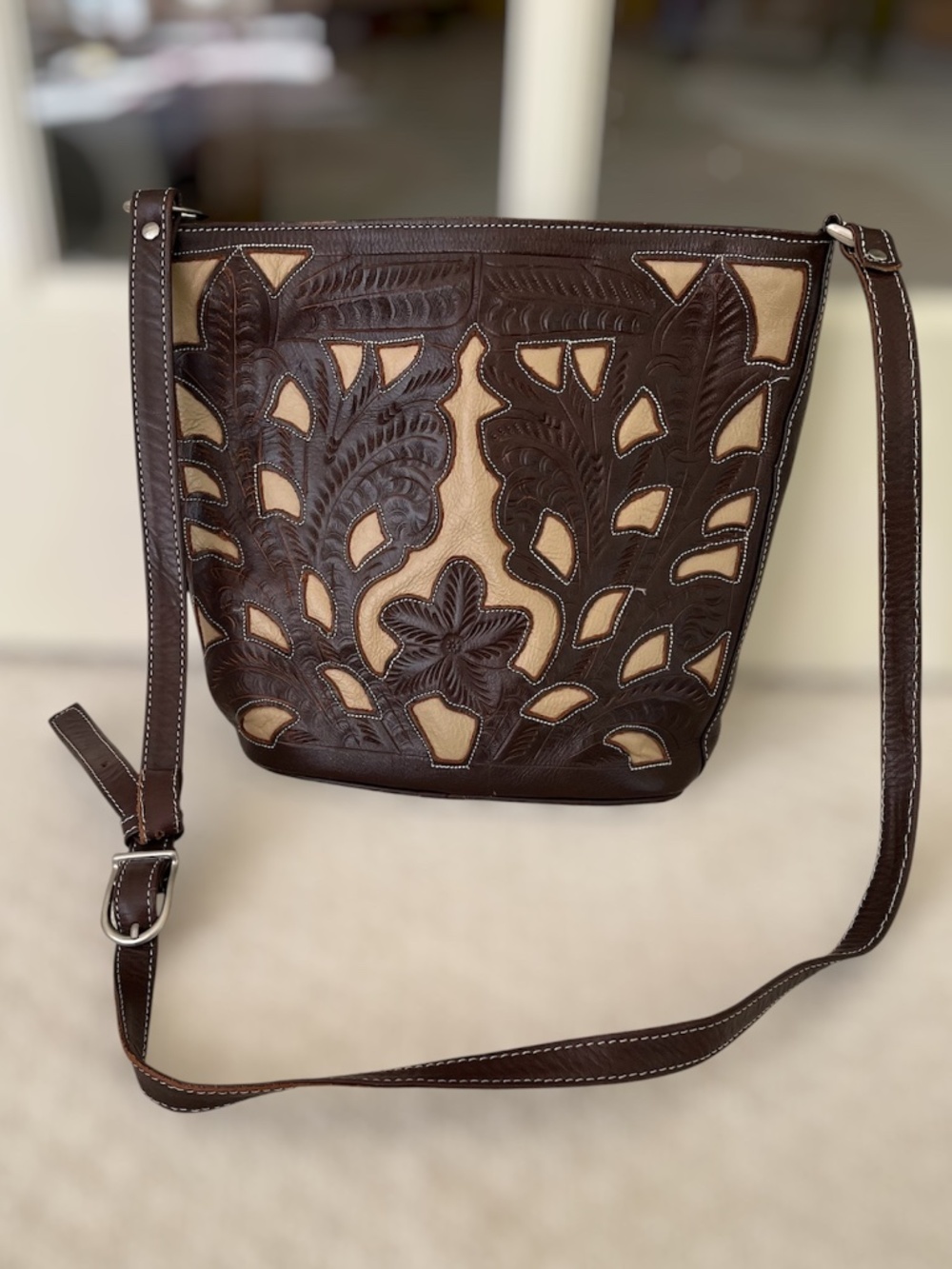 T. Saldivar Hand tooled vintage leather bucket cross body bag